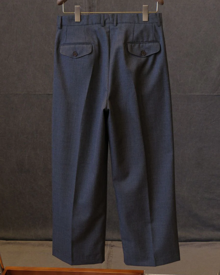 High-Waisted Pleated Wool Trousers - Image 13