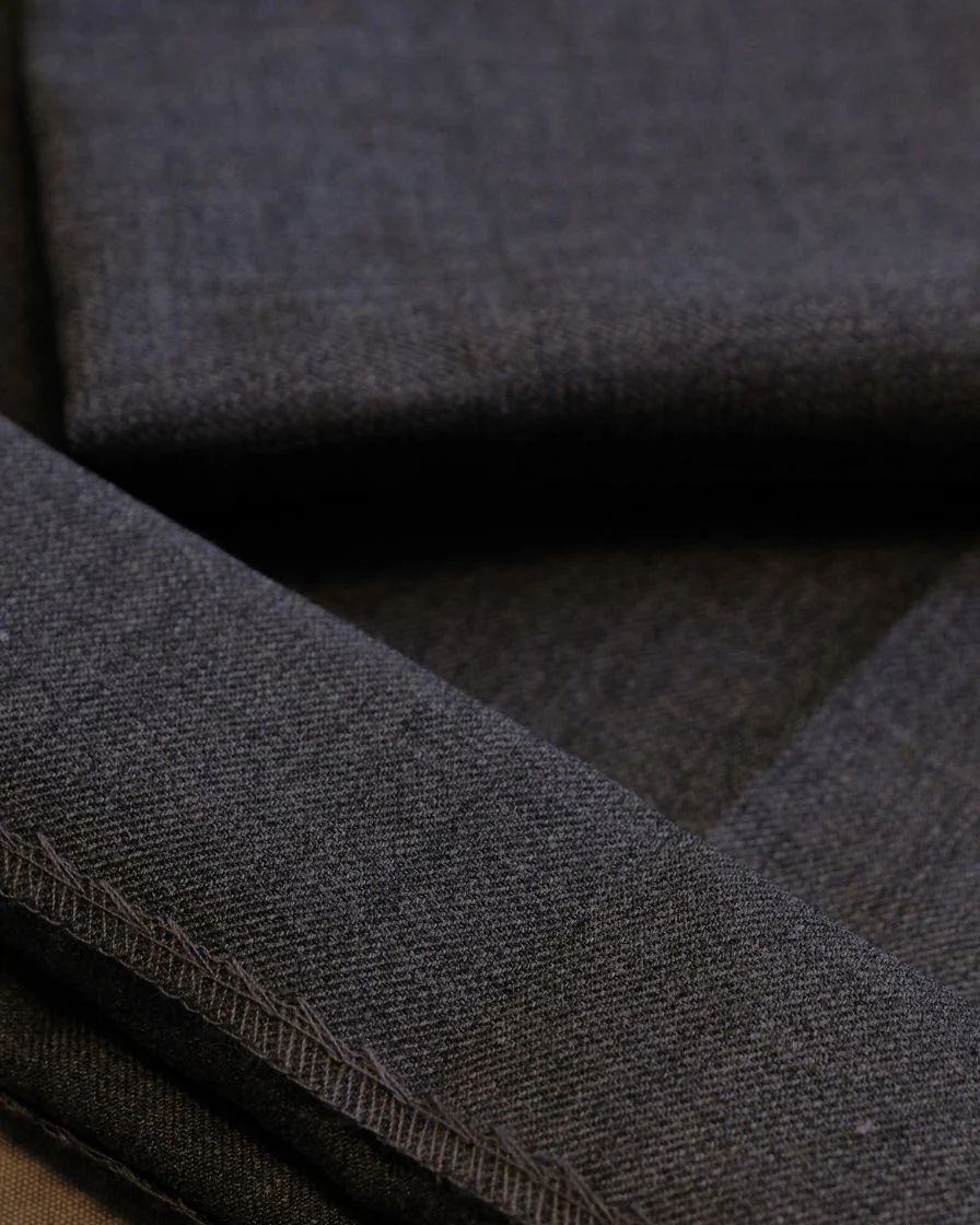 High-Waisted Pleated Wool Trousers - Image 15