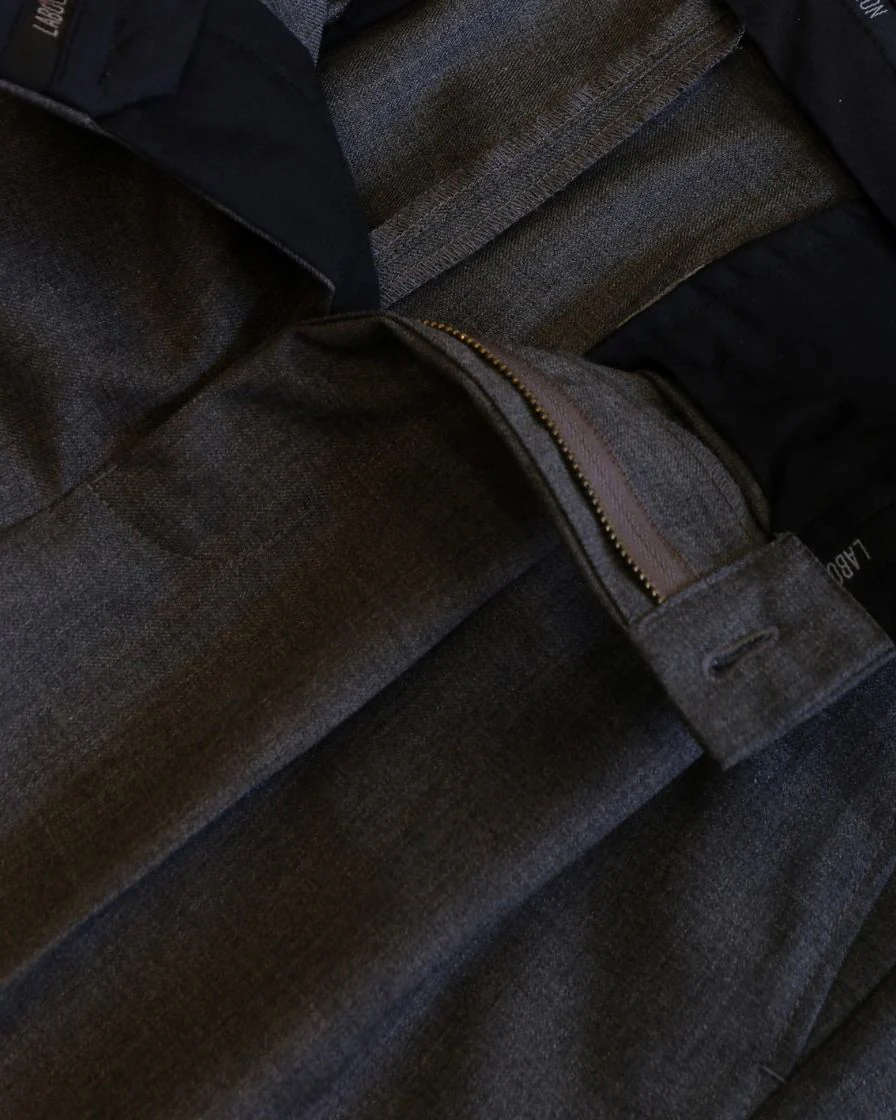 High-Waisted Pleated Wool Trousers - Image 16